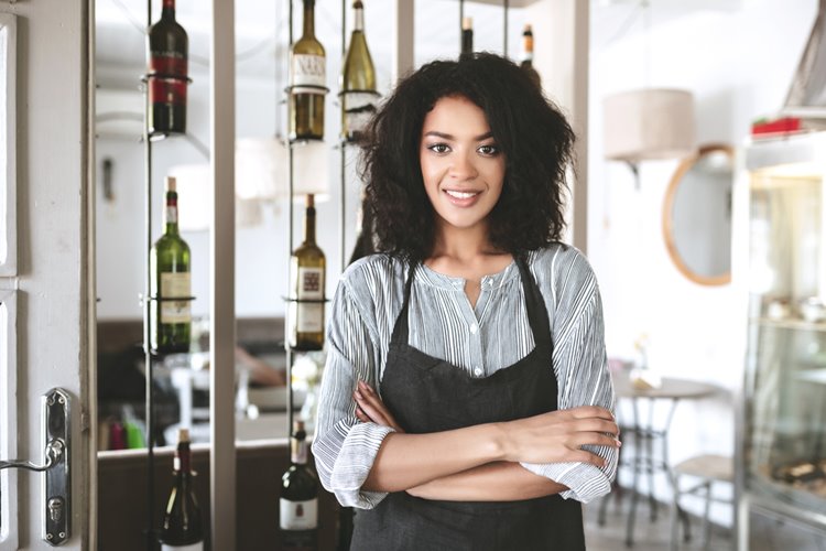 dark-skinned woman hospitality worker