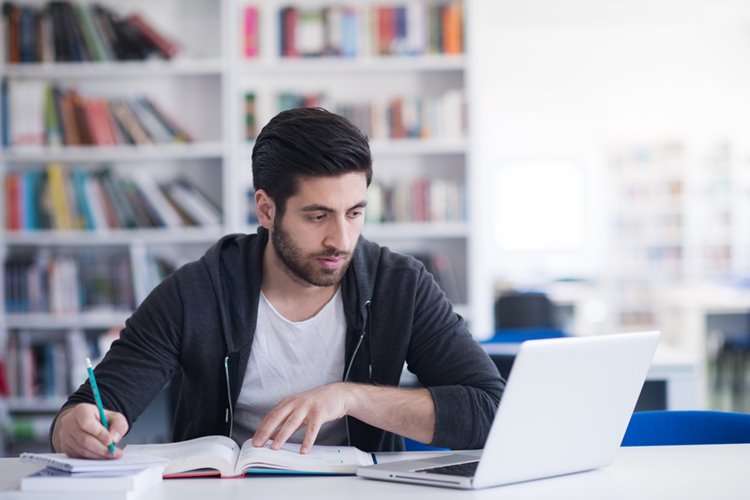 male student studying