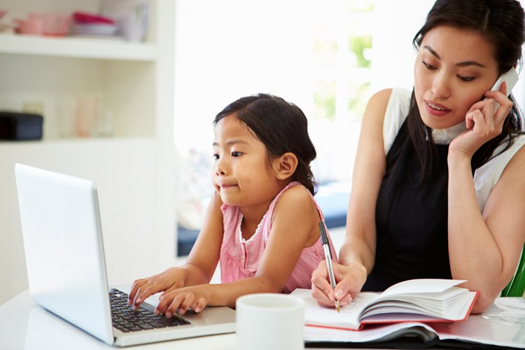 asian mother working from home