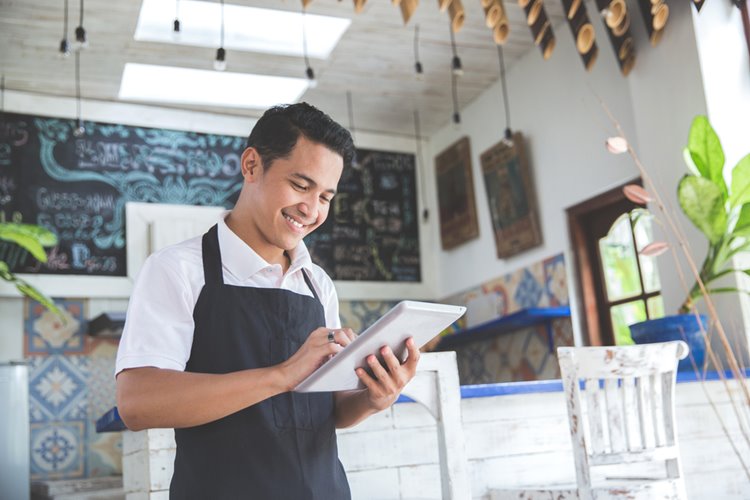young male cafe business owner