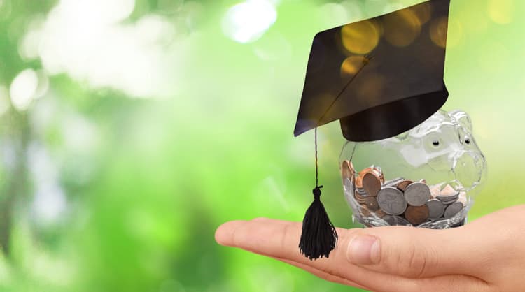 piggy bank with graduation hat