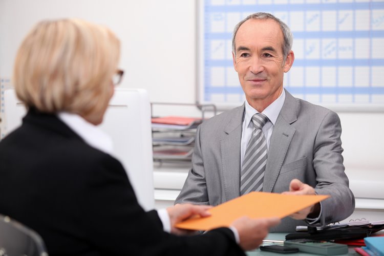 senior male business man with woman client