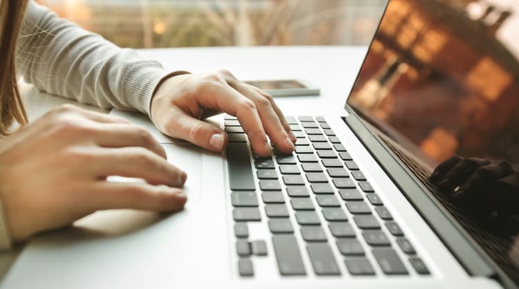 woman using laptop