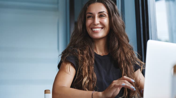 woman smiling away from camera