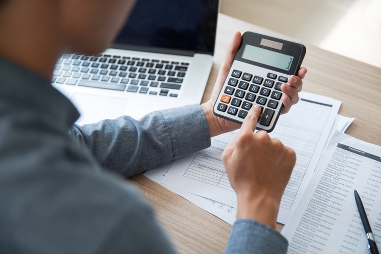 business man making calculations