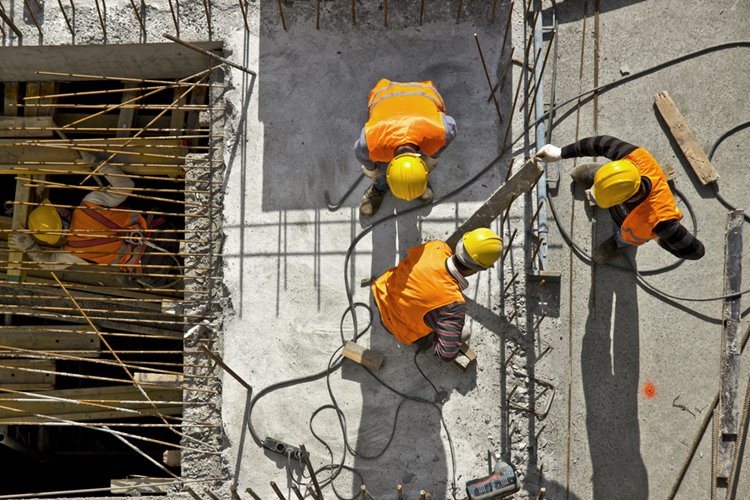 construction workers building on site