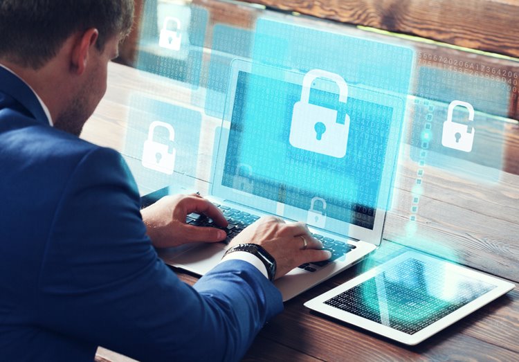 IT security specialist looking at security settings of IT system
