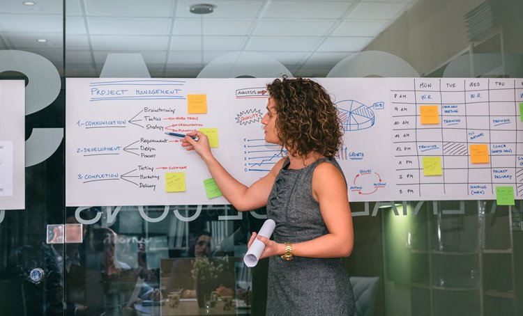 female project manager brainstorming upcoming business projects