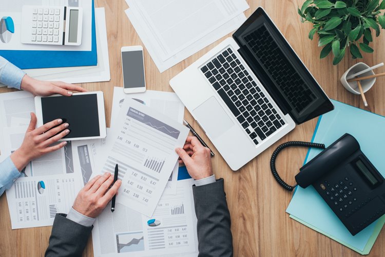 flatlay of business and finance workspace