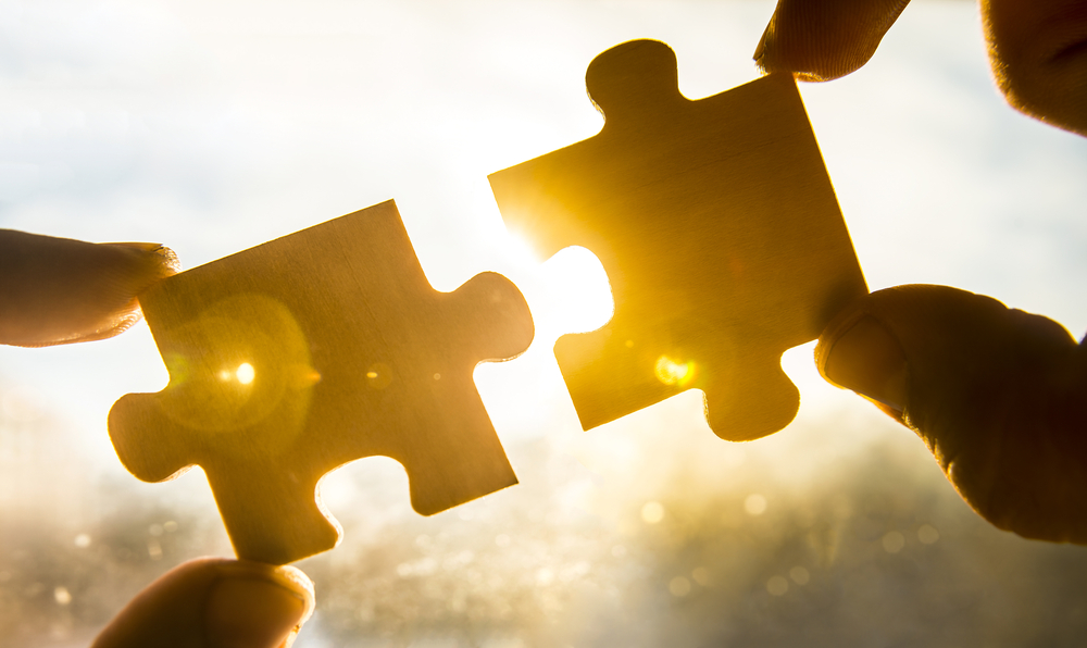puzzle pieces being put together