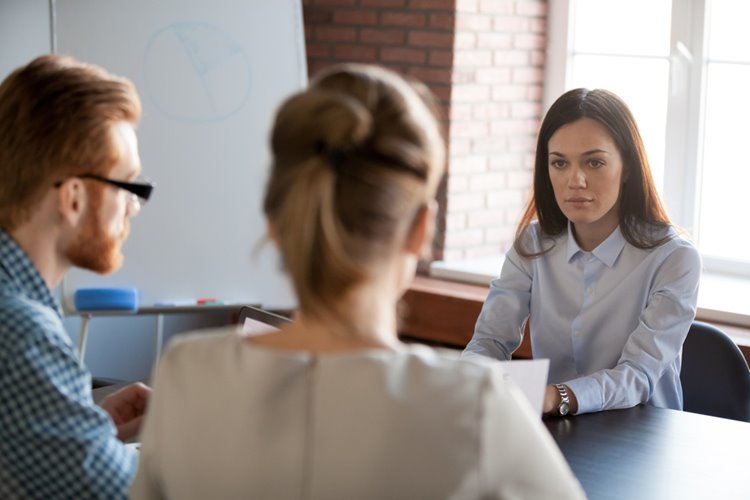 boss listening to employees