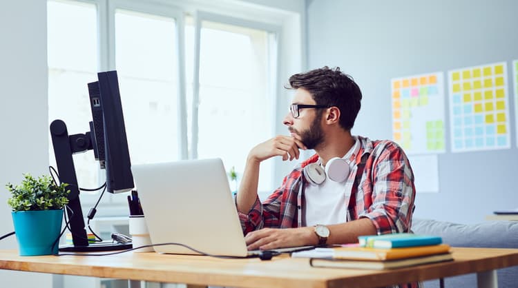 male web developer working from home